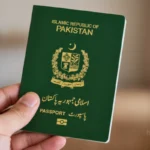 Pakistani man using smartphone to scan his passport for Australian Immi App biometric submission